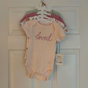 Cloud Island 6-9 month short sleeve onesies 4 pack. New with tags